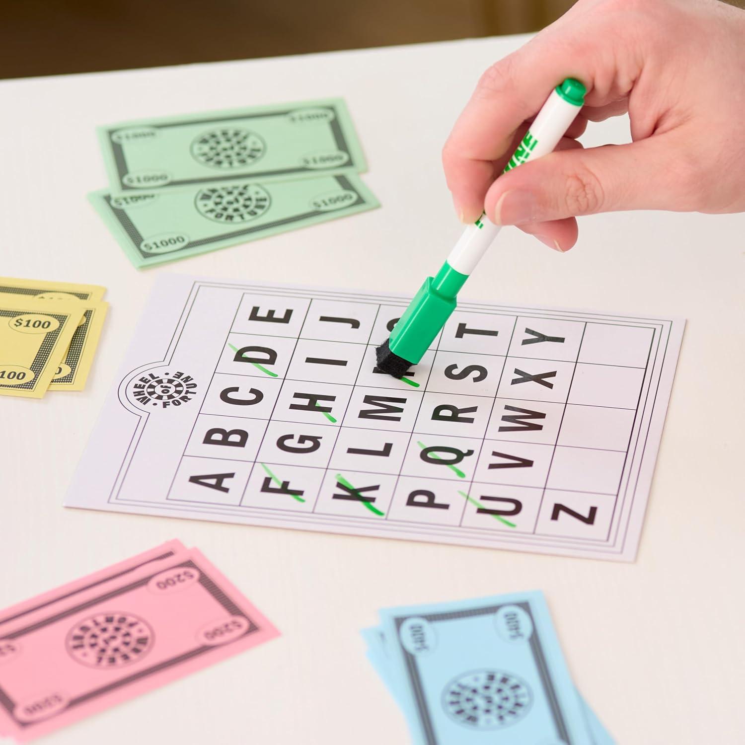 imageWheel of Fortune Deluxe Game 100 Puzzles Included Inspired by The Popular Show Interactive Puzzle Board Spin Guess Solve 24 Players Ages 10 and Up by Just Play
