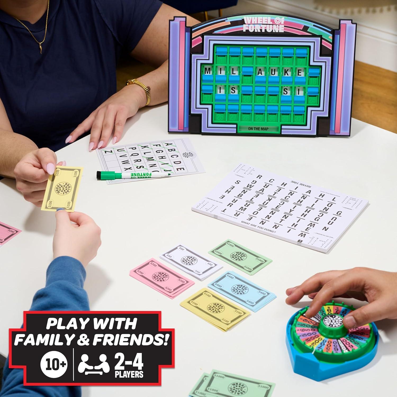 imageWheel of Fortune Deluxe Game 100 Puzzles Included Inspired by The Popular Show Interactive Puzzle Board Spin Guess Solve 24 Players Ages 10 and Up by Just Play