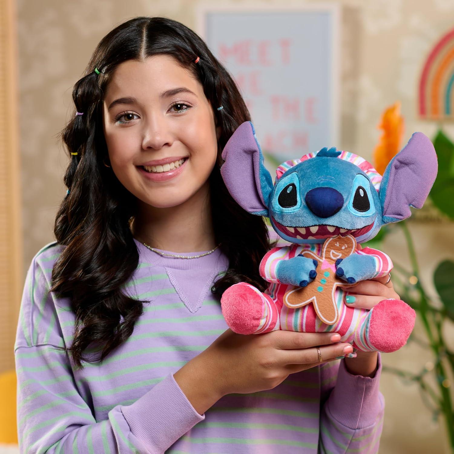 imageDisney Stitch 10inch Holiday Feature Plush Stitch Stuffed Animal with Music and Motion Soft Cuddly Material Toy for Fans Girls Boys Kids Ages 3 and Up by Just Play