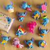 Disney Stitch Blind Mini Figures 2-Pack, 2-inch Collectible Figurines and 2 Reusable Burger Boxes, Holiday Stocking Stuffers, Gifts, Presents, Kids Toys for Ages 3 Up